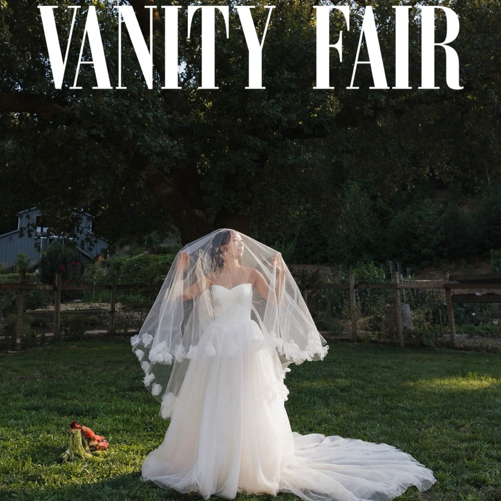 Elegant White Wedding Dress with Floral Veil